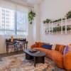 A bright living room with expansive windows