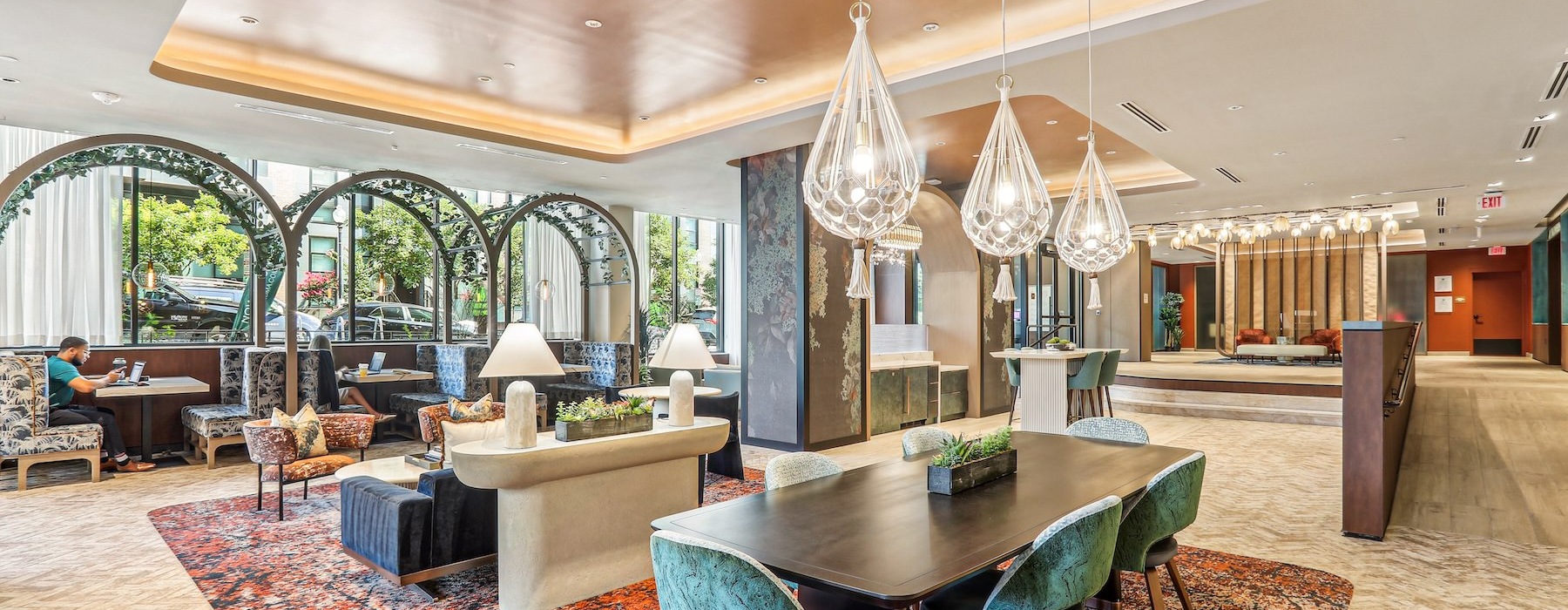 Beautiful lobby with concierge, multiple seating options and co-working space