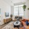 Living room with couch and expansive windows