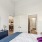 Large bedroom with expansive windows