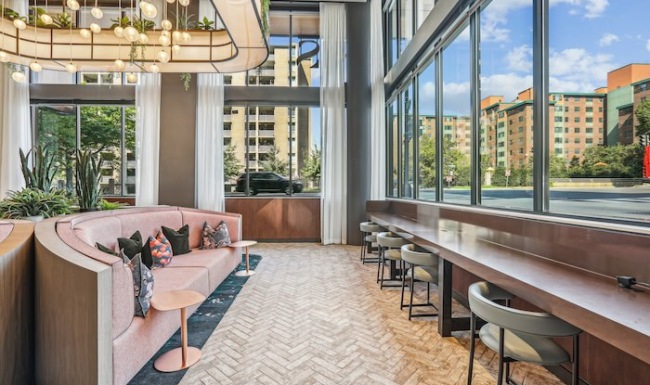 View of downtown from lobby co-working space Lobby seating area with downtown view